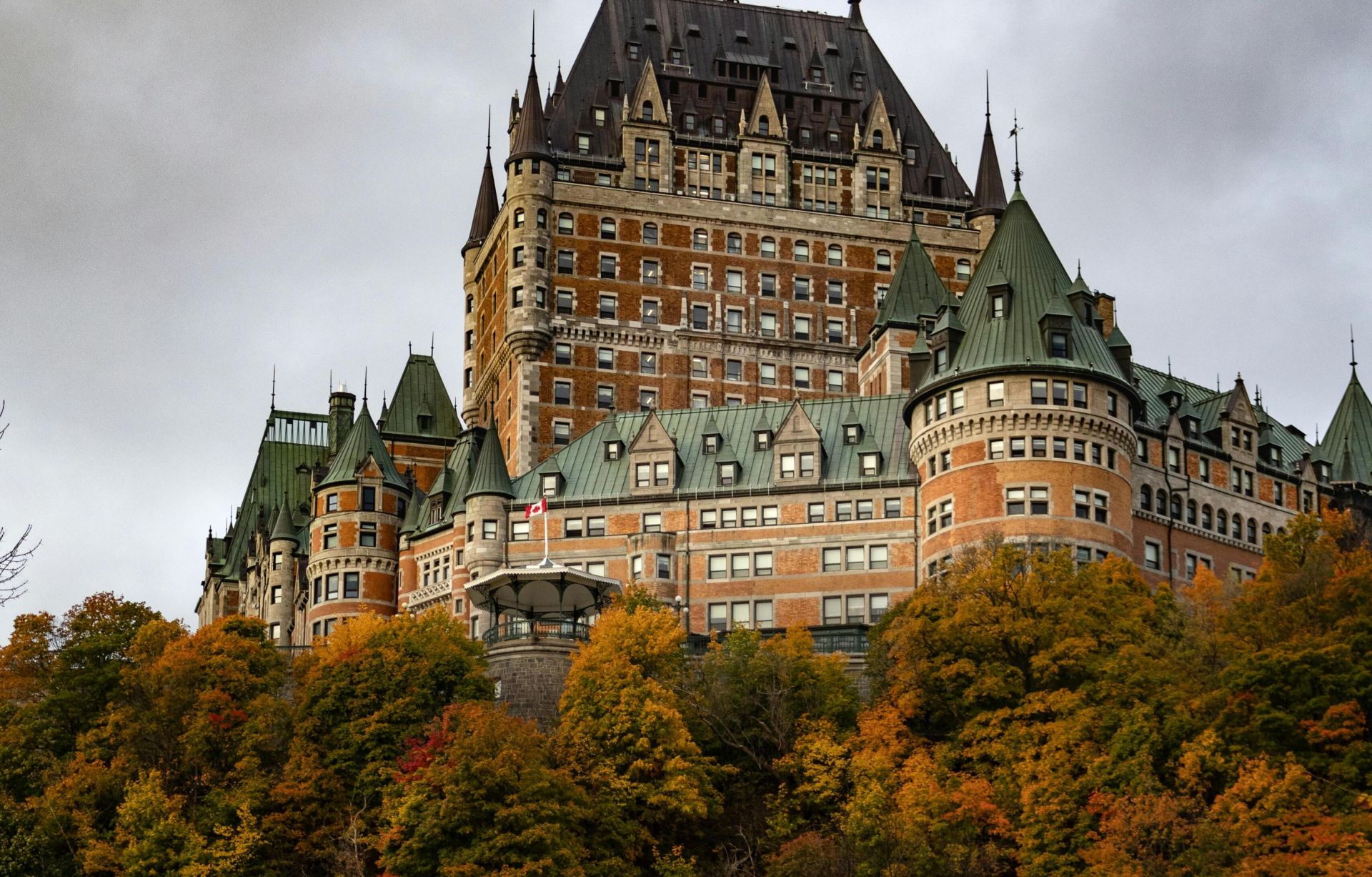 Stunning view of Château Frontenac during autumn in Quebec City, showcasing gothic architecture.